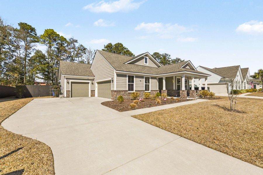 Front exterior of a new home in , Johns Island, SC, highlighting curb appeal (Image 23).