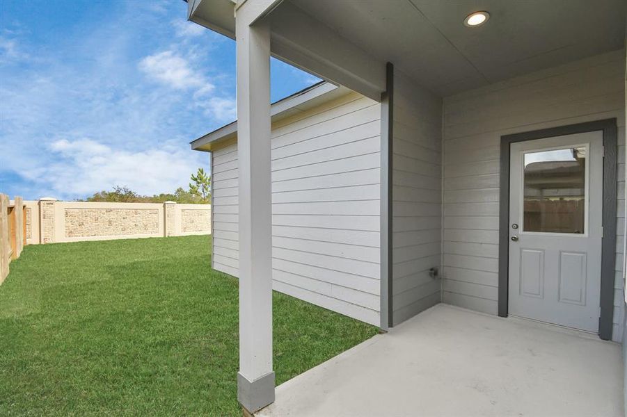 Step into a world of outdoor possibilities with this remarkable backyard and its charming covered patio. From playtime for the kids to relaxation for the adults, this space offers the best of both worlds. Customize it with patio furniture, a BBQ pit, and more, turning it into the ultimate outdoor retreat that suits your lifestyle.