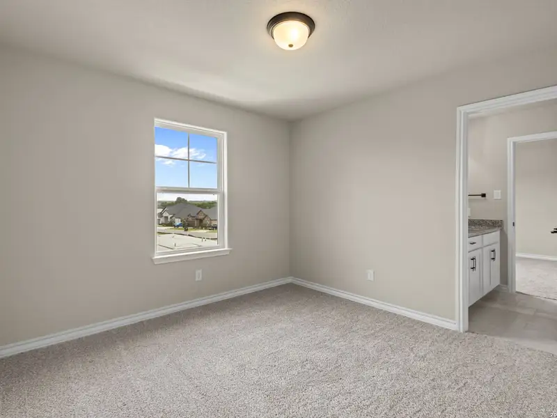 Spacious, unfurnished interior of a new home in The Reserve at Potranco Oaks, Castroville (Image 41).