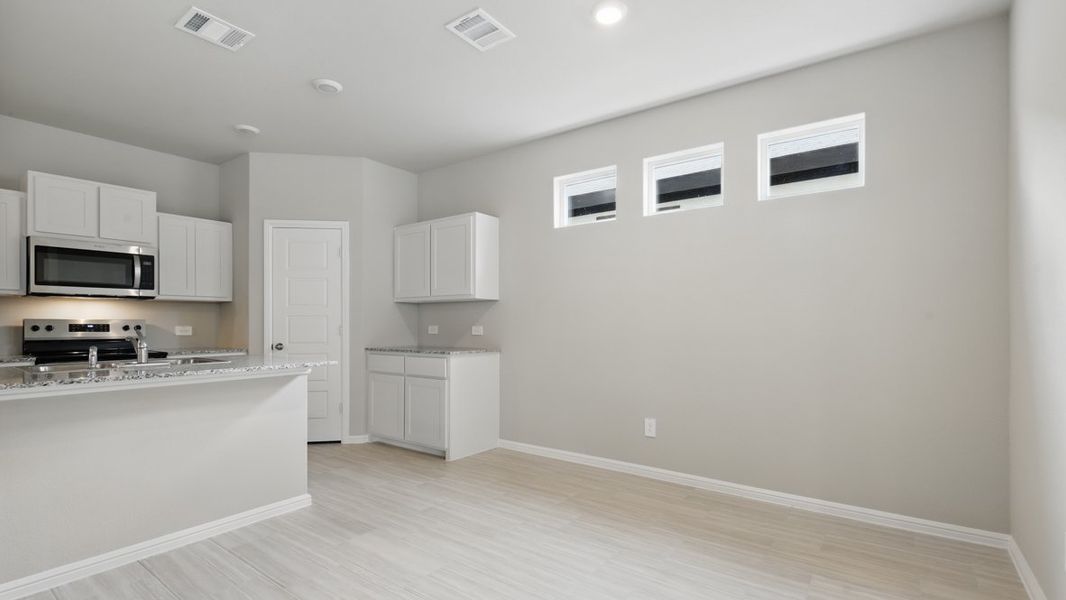 Representative furnished interior of a home built from the ALMOND by D.R. Horton in Orchard Village, Fort Worth (Image 10). Representative furnished interior of a home built from the ALMOND by D.R. Horton in Orchard Village, Fort Worth (Image 10).