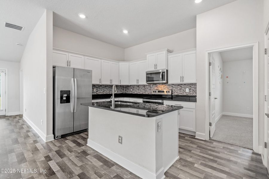Furnished interior view inside a new home in Shadow Crest at Rolling Hills, Green Cove Springs (Image 10).