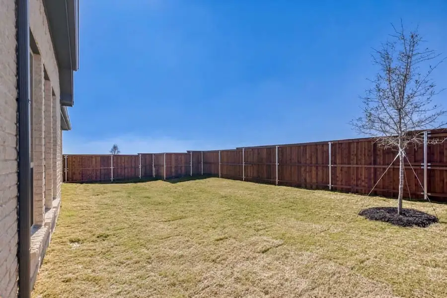 Exterior details and patio area of a home in Meraki, Forney (Image 21).