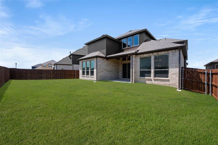 Exterior details and patio area of a home in Birdsong, Mansfield (Image 2). Exterior details and patio area of a home in Birdsong, Mansfield (Image 2).