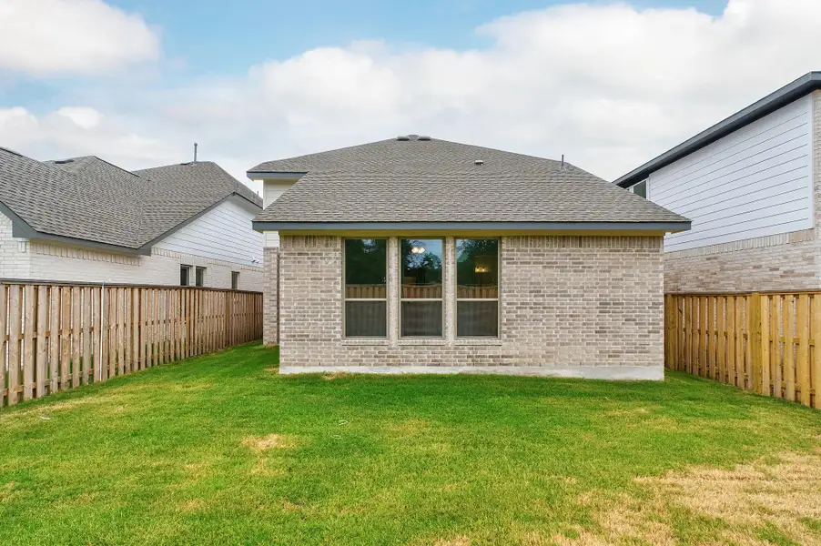 Exterior details and patio area of a home in Parmer Ranch, Georgetown (Image 24). Exterior details and patio area of a home in Parmer Ranch, Georgetown (Image 24).