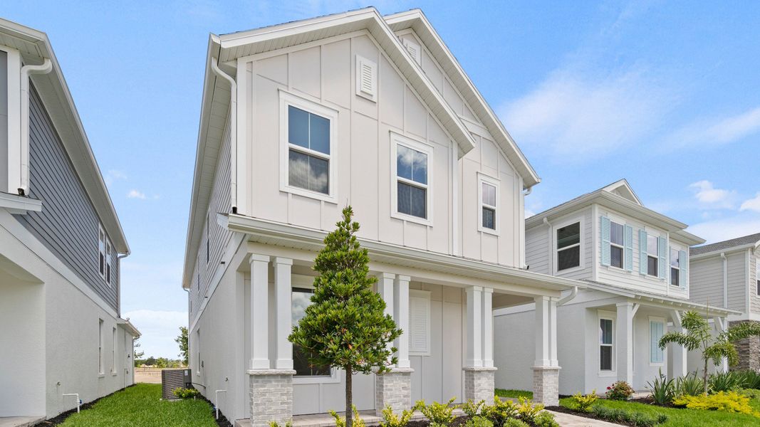 Mandarin Elevation Farmhouse by DRB Homes in Trinity Place located in St Cloud, FL Near Orlando Mandarin Elevation Farmhouse by DRB Homes in Trinity Place located in St Cloud, FL Near Orlando