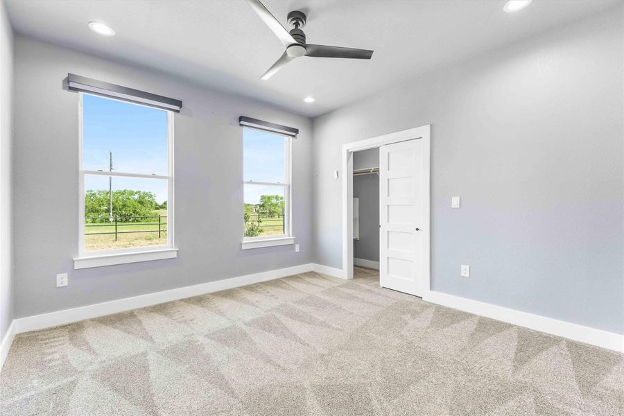 Unfurnished bedroom featuring carpet floors, recessed lighting, baseboards, a closet, and ceiling fan Unfurnished bedroom featuring carpet floors, recessed lighting, baseboards, a closet, and ceiling fan