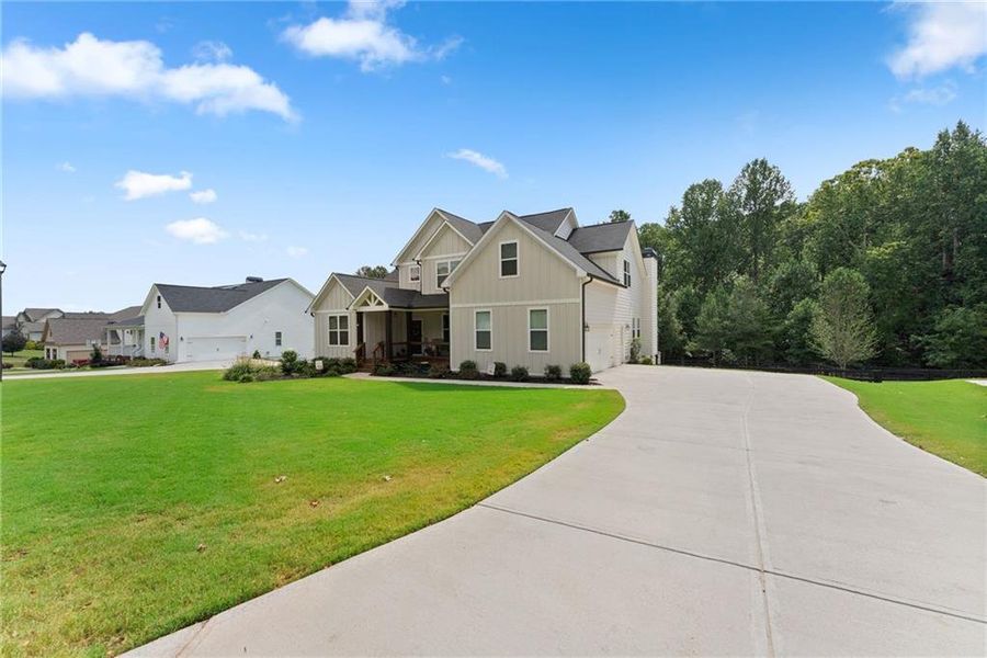 Front exterior of a new home in , Dawsonville, GA, highlighting curb appeal (Image 26).