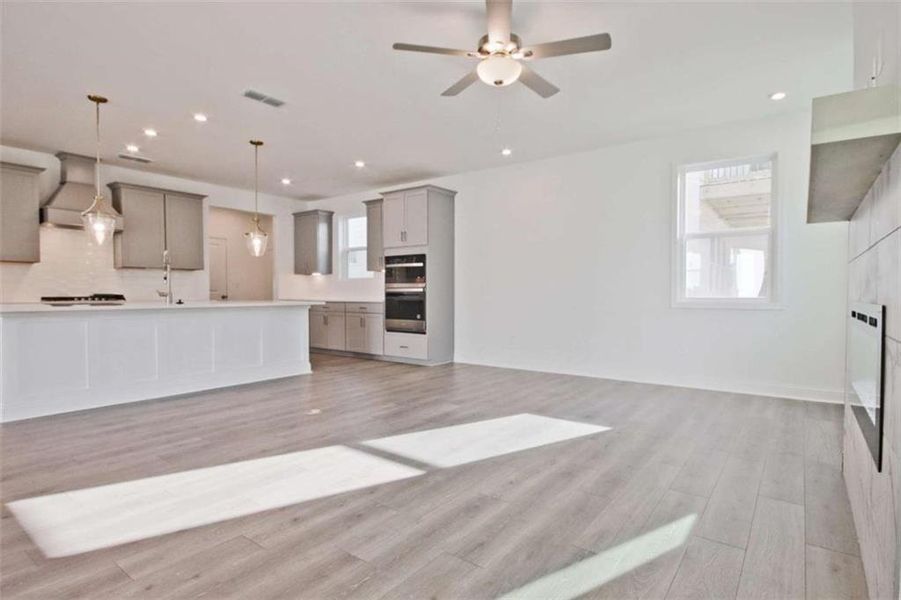 Spacious, unfurnished interior of a new home in The Paddocks at Doc Hughes, Buford (Image 36).