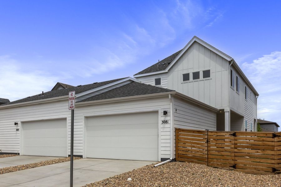 Front exterior of a new home in Trailside on Harmony, Timnath, CO, highlighting curb appeal (Image 25).