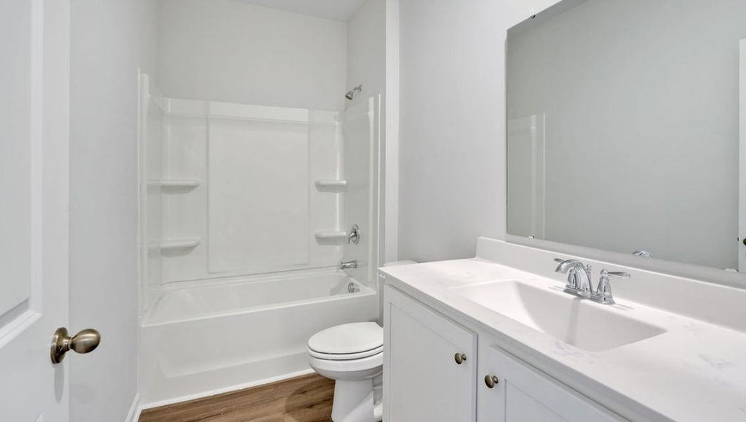 Furnished interior view inside a new home in Bella Point, Bolivia (Image 5).