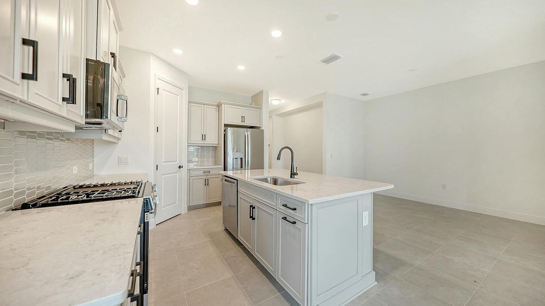 Furnished interior view inside a new home in Palmera Real Estate and Homes for Sale in Venice, FL - Neal Communities, Venice (Image 13). Furnished interior view inside a new home in Palmera Real Estate and Homes for Sale in Venice, FL - Neal Communities, Venice (Image 13).