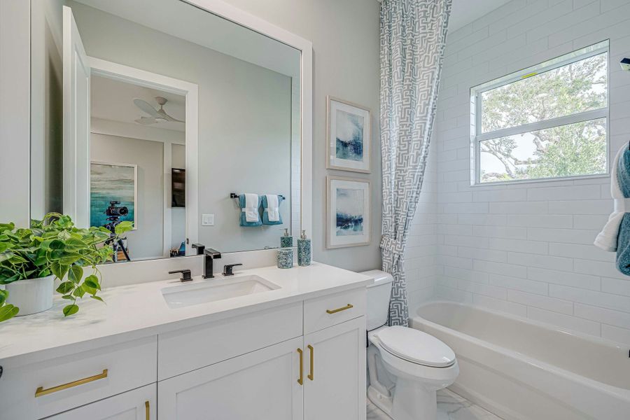 2D floor plan layout for the Sand Dollar Grande by GHO Homes in The Strand, Indian River Shores, FL (Image 73).