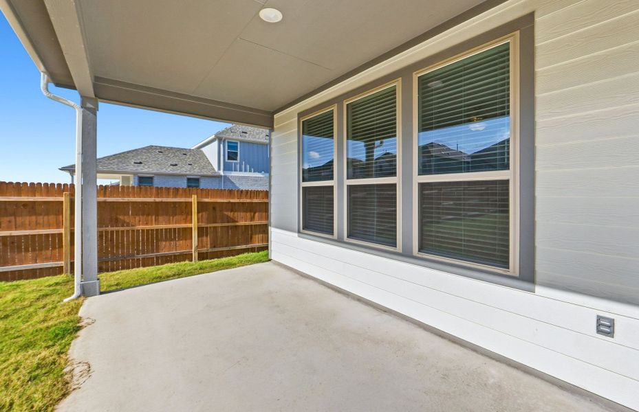 Exterior details and patio area of a home in Santa Rita Ranch, Liberty Hill (Image 30). Exterior details and patio area of a home in Santa Rita Ranch, Liberty Hill (Image 30).