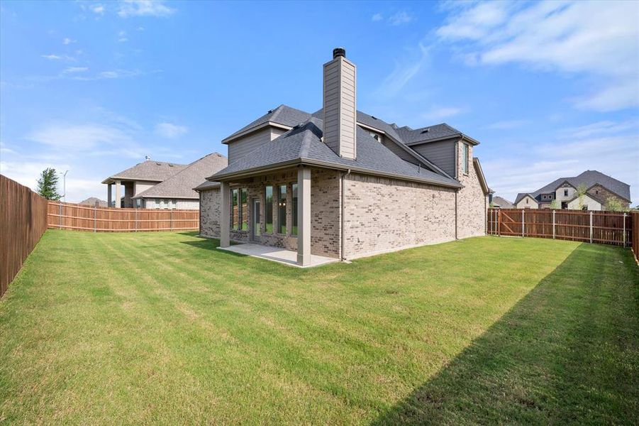 Exterior details and patio area of a home in , Midlothian (Image 4). Exterior details and patio area of a home in , Midlothian (Image 4).