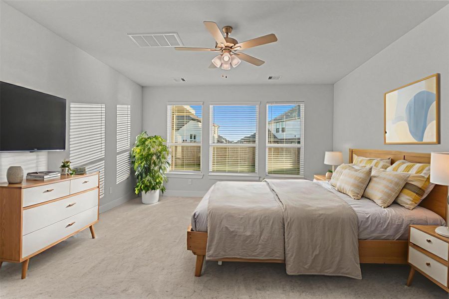 Virtually staged: Another view of the primary suite highlights its generous size and flexible layout—perfect for a king bed, dresser, or reading nook—creating a relaxing escape right at home. Virtually staged: Another view of the primary suite highlights its generous size and flexible layout—perfect for a king bed, dresser, or reading nook—creating a relaxing escape right at home.