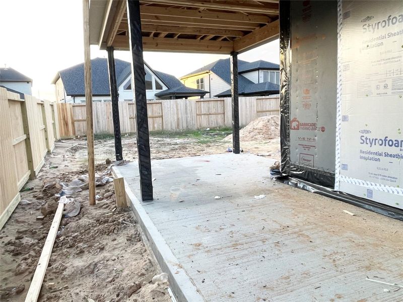 Oversized Patio Overlooking the Calming Backyard Views