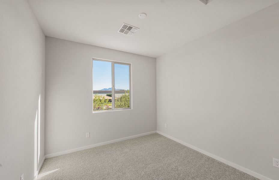 Spacious, unfurnished interior of a new home in Legado West, Queen Creek (Image 22).