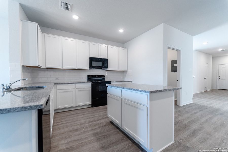 Furnished interior view inside a new home in Katzer Ranch, Converse (Image 2). Furnished interior view inside a new home in Katzer Ranch, Converse (Image 2).