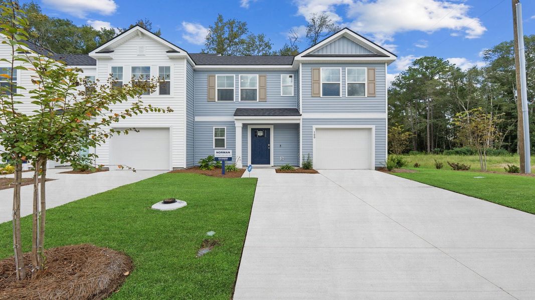 Representative exterior photo of a completed home built from the Norman by D.R. Horton in McKenzie Gardens, Brunswick, GA (Image 24).