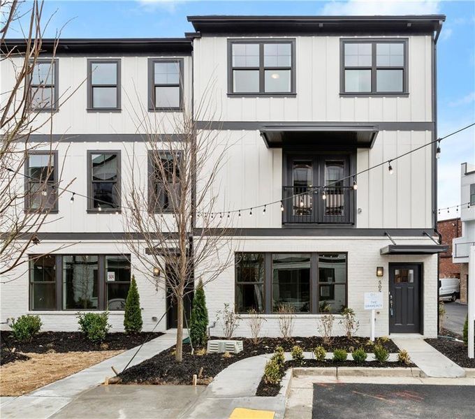 Front exterior of a new home in One Riverside West, Atlanta, GA, highlighting curb appeal (Image 20).