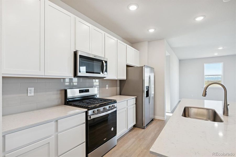 Furnished interior view inside a new home in Sweetgrass, Dacono (Image 7).