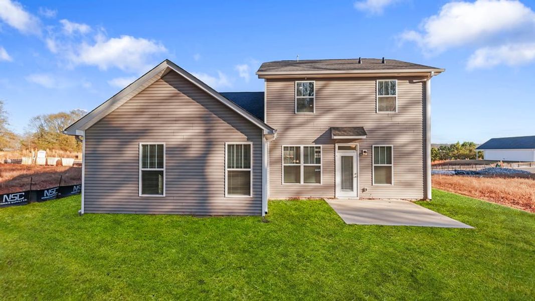 Exterior details and patio area of a home in Palmetto Valley, Anderson (Image 4).