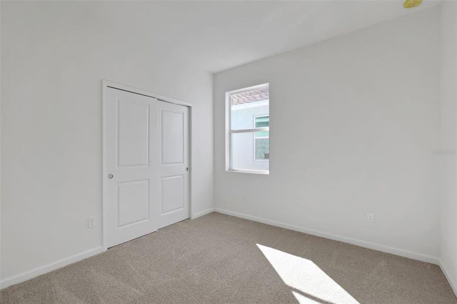 Spacious, unfurnished interior of a new home in Brystol North at Wylder, Port St. Lucie (Image 28).