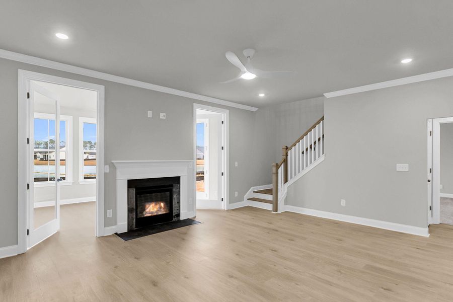 Spacious, unfurnished interior of a new home in Tidewater at Lakes of Cane Bay, Summerville (Image 28).