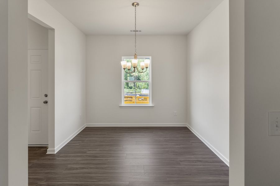 Spacious, unfurnished interior of a new home in The Exchange, Vass (Image 15).