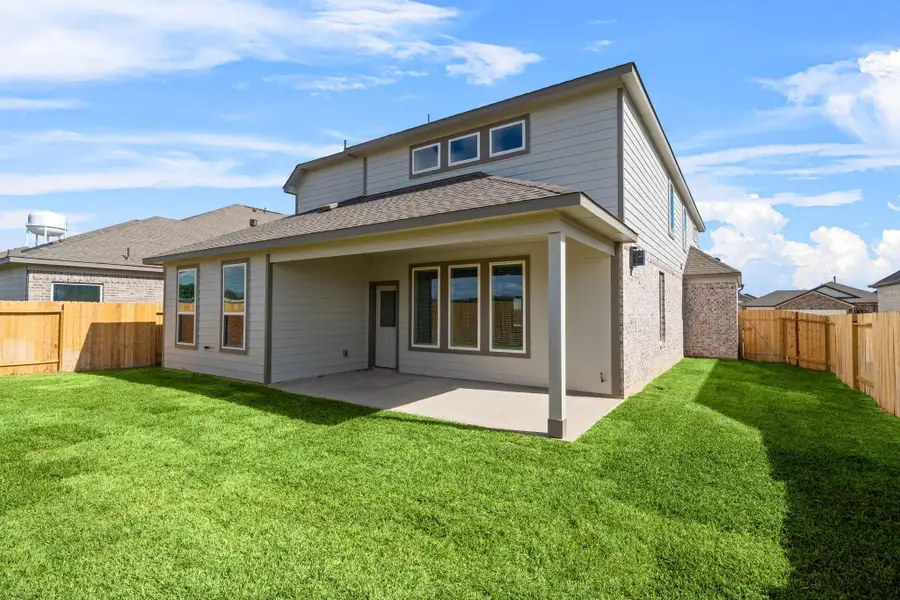 Exterior details and patio area of a home in Beacon Hill, Waller (Image 4). Exterior details and patio area of a home in Beacon Hill, Waller (Image 4).
