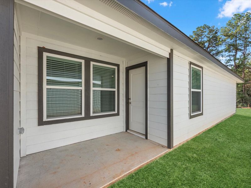 Exterior details and patio area of a home in William Trails, Willis (Image 4).