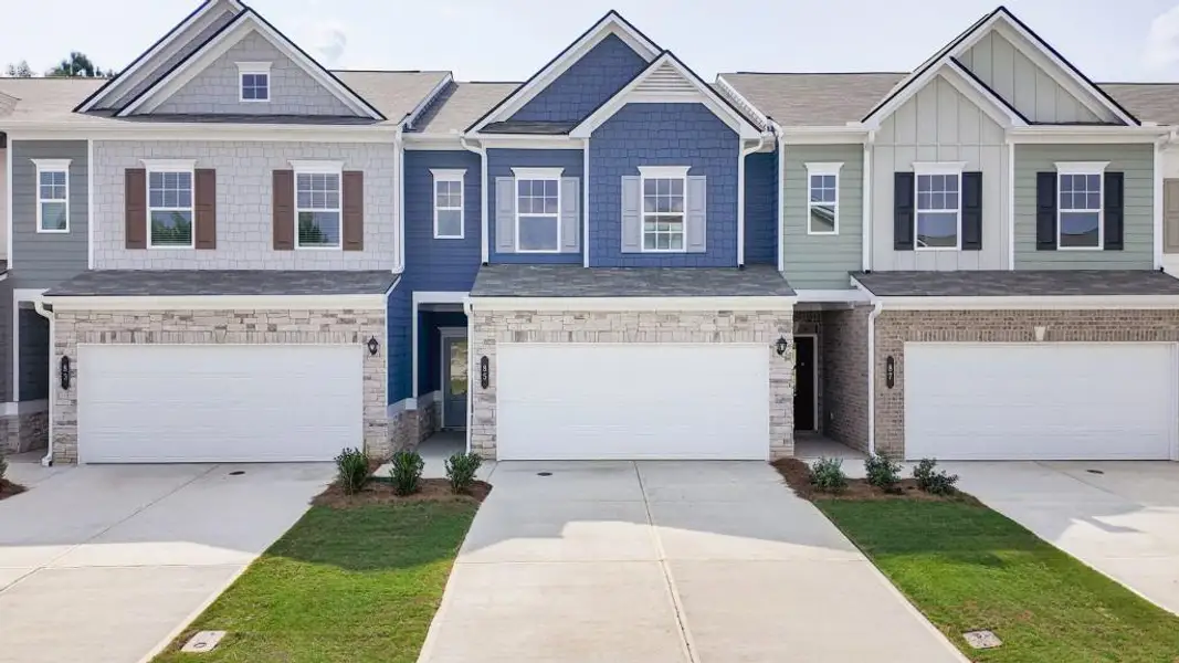 Front exterior of a new home in Sterling At The Villages, Calhoun, GA, highlighting curb appeal (Image 1).