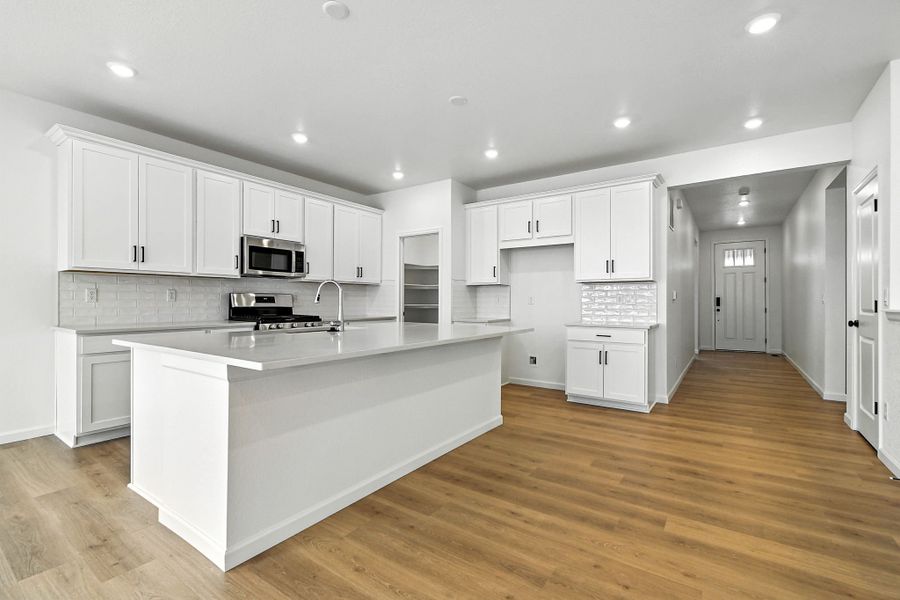 Furnished interior view inside a new home in Trailstone, Arvada (Image 9).