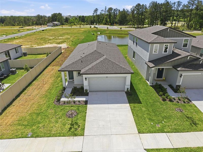 Front exterior of a new home in Leyland Preserve - Premier Series, Brooksville, FL, highlighting curb appeal (Image 32).