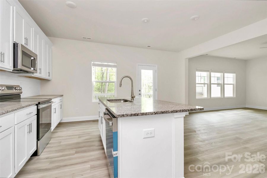 Furnished interior view inside a new home in , Monroe (Image 12).