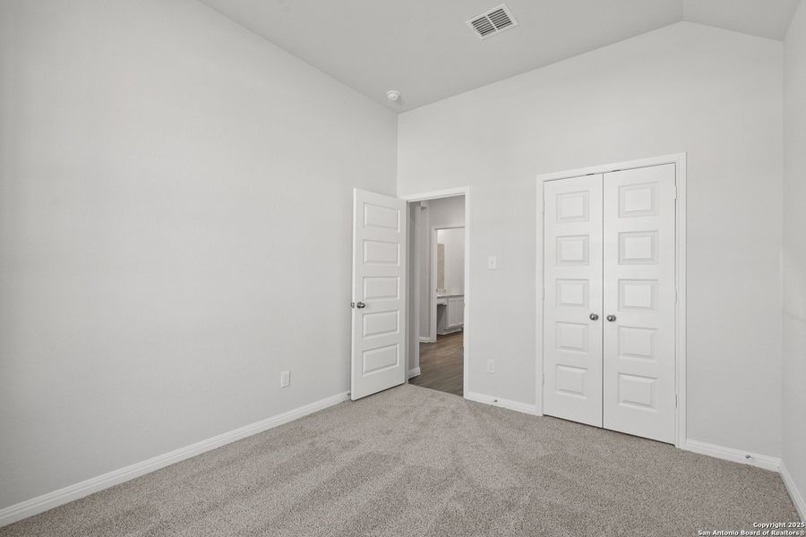 Spacious, unfurnished interior of a new home in Hunters Ranch, San Antonio (Image 13).