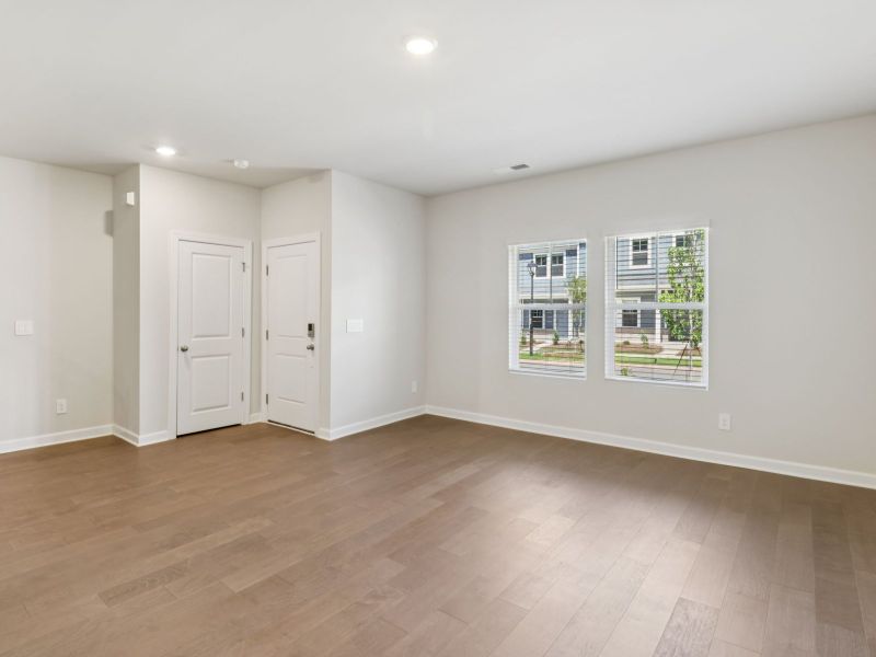 The great room offers an abundance of natural light. The great room offers an abundance of natural light.