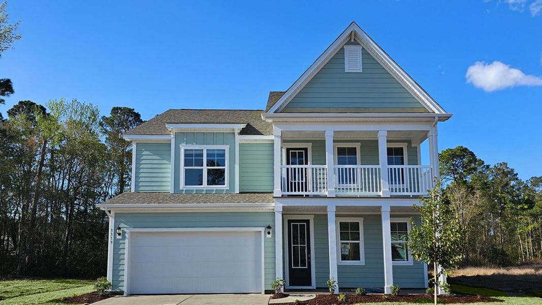 Front exterior of a new home in The Preserve at Shaftesbury Glen, Conway, SC, highlighting curb appeal (Image 2). Front exterior of a new home in The Preserve at Shaftesbury Glen, Conway, SC, highlighting curb appeal (Image 2).