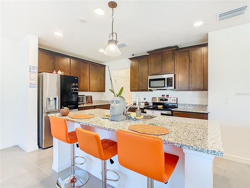 Furnished interior view inside a new home in Horse Creek at Crosswinds, Davenport (Image 4).