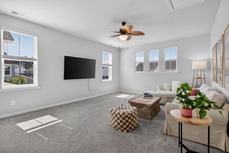 Furnished interior view inside a new home in Sweetgrass at Summers Corner, Summerville (Image 35).