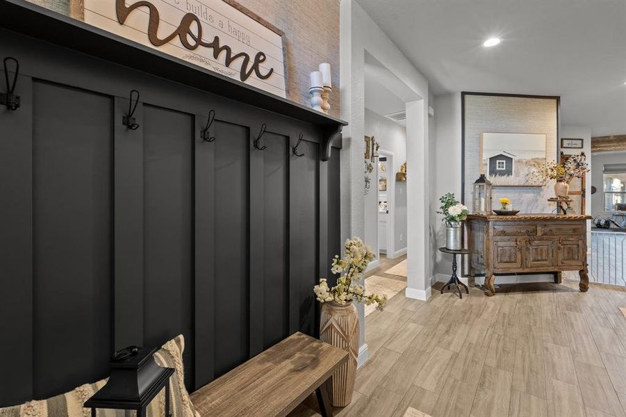 Mudroom featuring light wood-type flooring