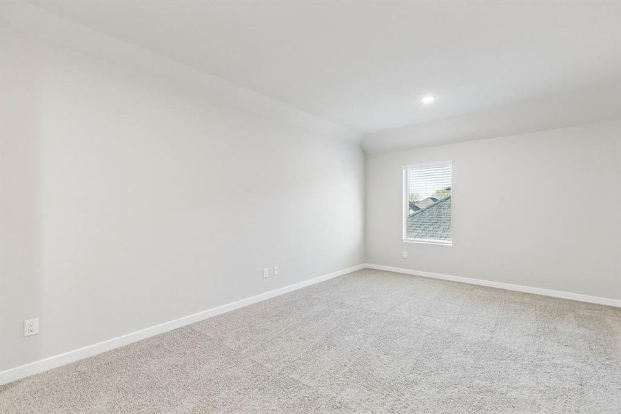 Bedroom in the Haylee home plan by Trophy Signature Homes - REPRESENTATIVE PHOTO