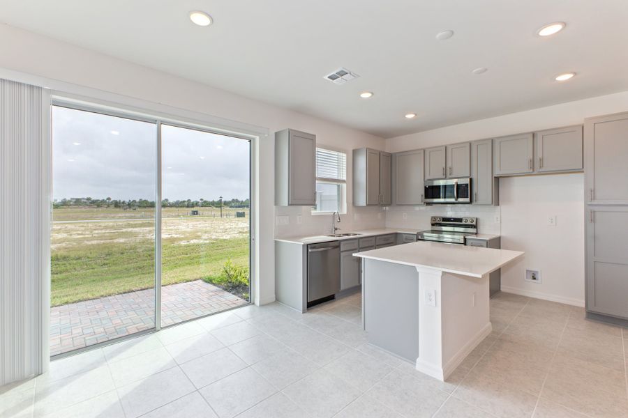 Representative furnished interior of a home built from the Carter by Park Square Residential in Townwalk at Babcock Ranch, Punta Gorda (Image 4).