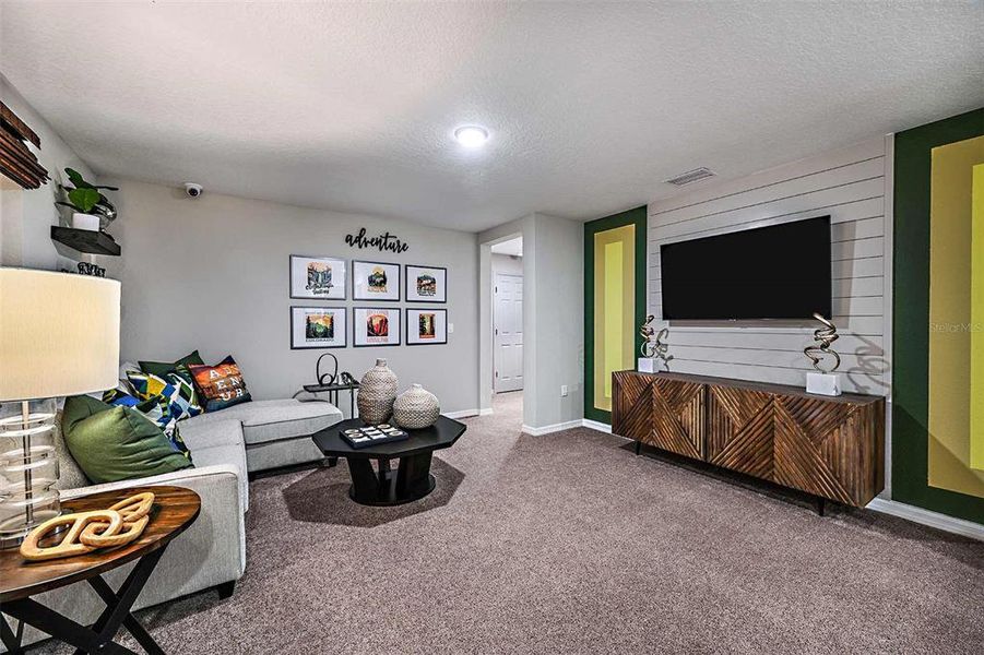 Furnished interior view inside a new home in Scenic Terrace, Haines City (Image 26).