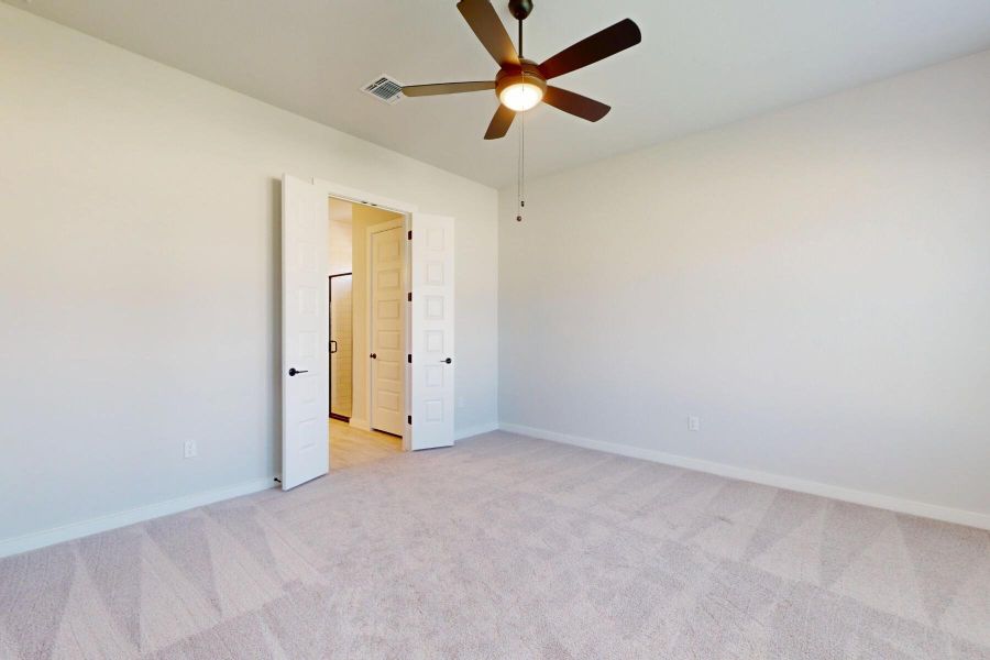Spacious, unfurnished interior of a new home in Cascades at Onion Creek, Austin (Image 24).