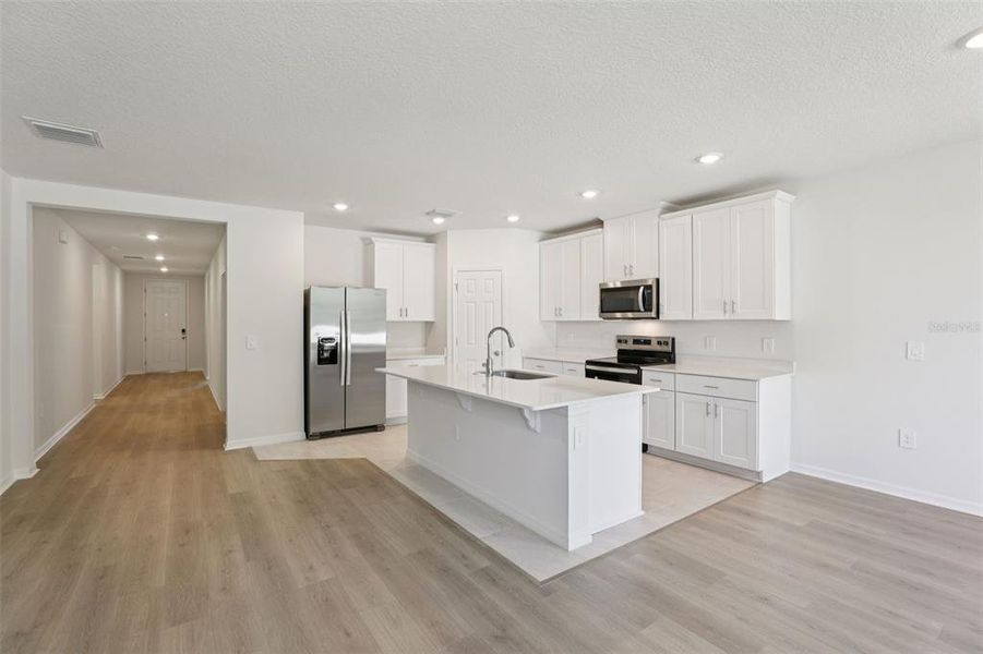 Furnished interior view inside a new home in Bradbury Creek - Signature Series, Haines City (Image 9).