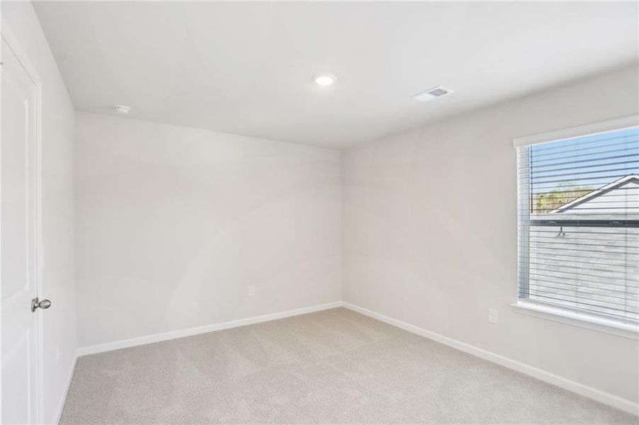 Spacious, unfurnished interior of a new home in Westmont Preserve, Powder Springs (Image 32).