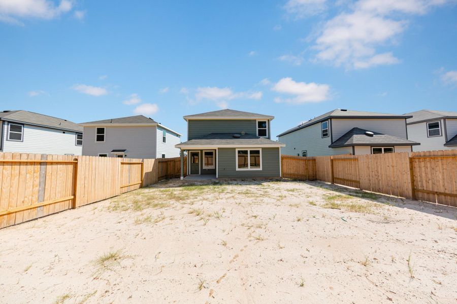Exterior details and patio area of a home in Townsend Reserve, Splendora (Image 2).