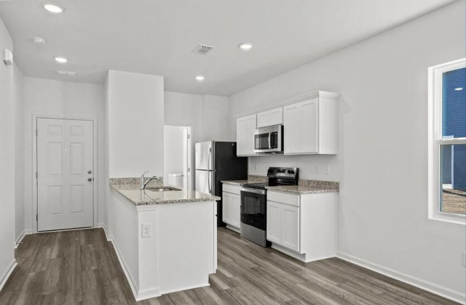 Furnished interior view inside a new home in , Ridgeville (Image 2). Furnished interior view inside a new home in , Ridgeville (Image 2).