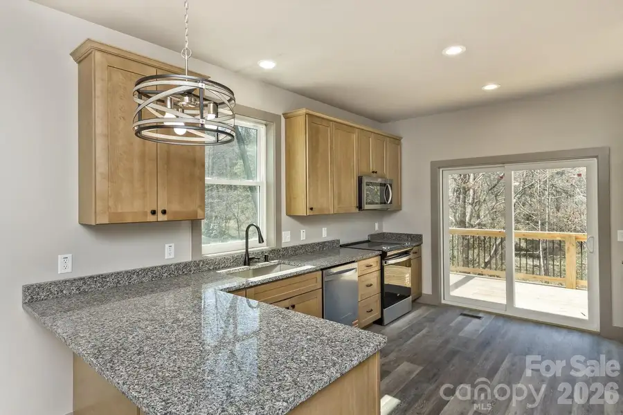 Furnished interior view inside a new home in , Asheville (Image 5).